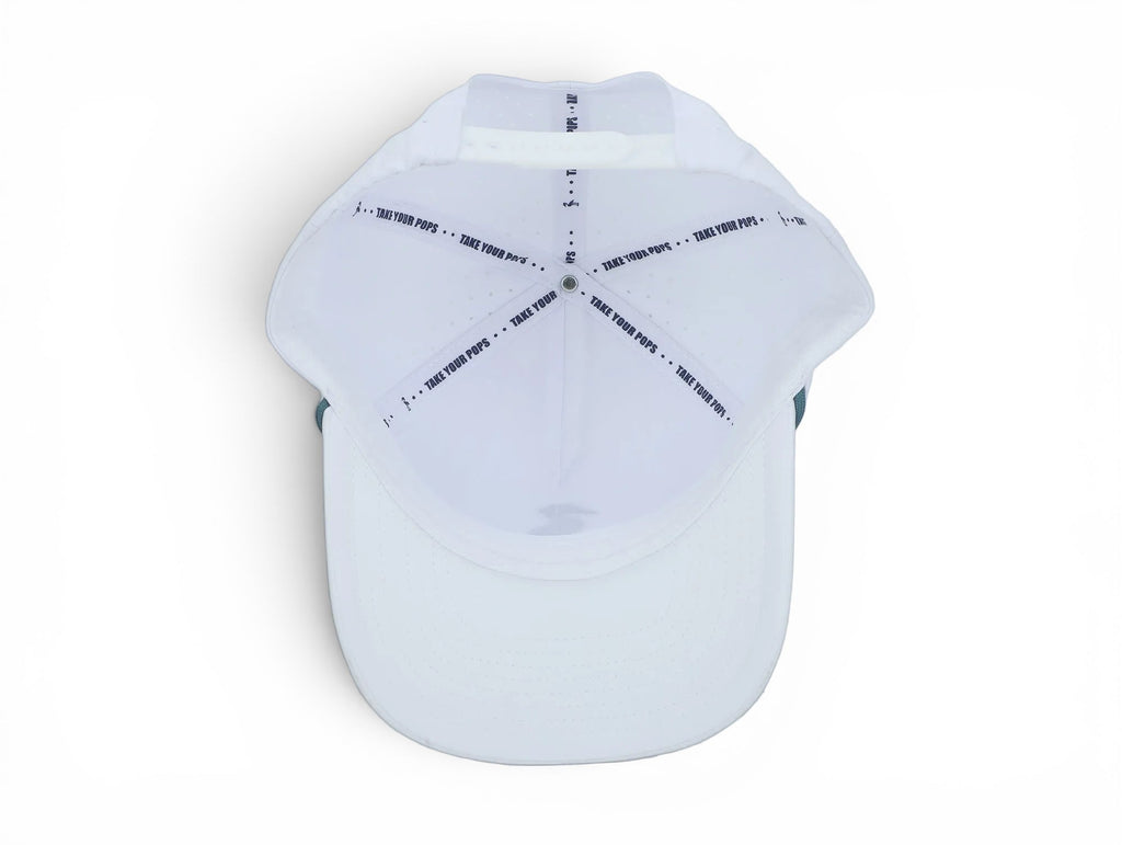 Interior view of 2 POPS Golf The Heron hat in coastal blue, showing white panels and branded interior taping.