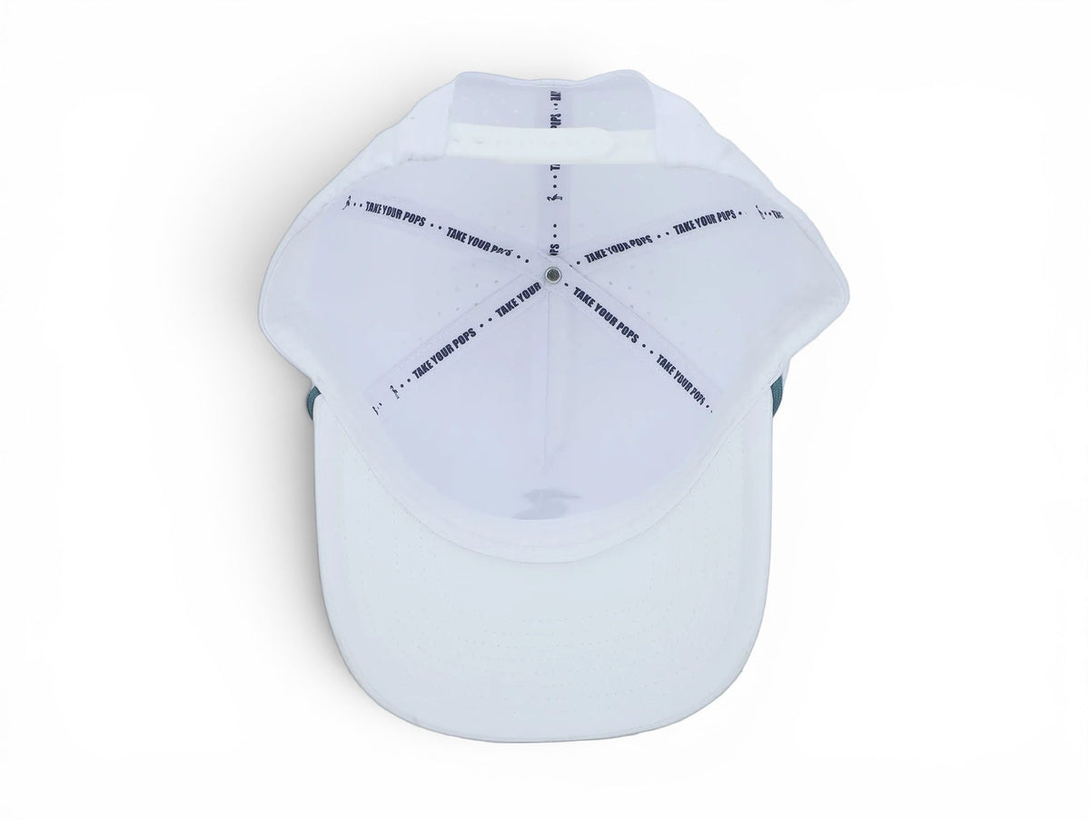 Interior view of 2 POPS Golf The Heron hat in coastal blue, showing white panels and branded interior taping.